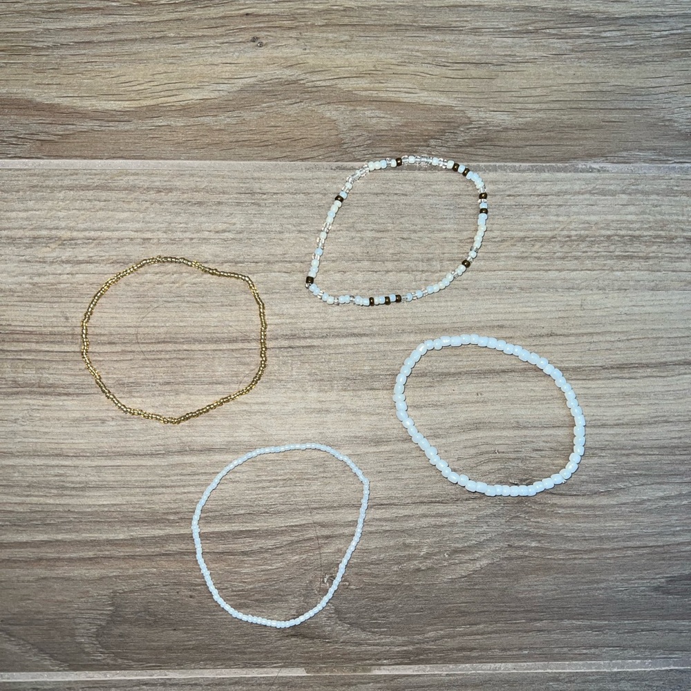 Set of Beaded Bracelets in White and Gold